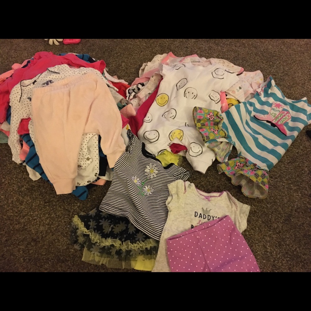 A LOT of baby girl clothes and a couple of boys